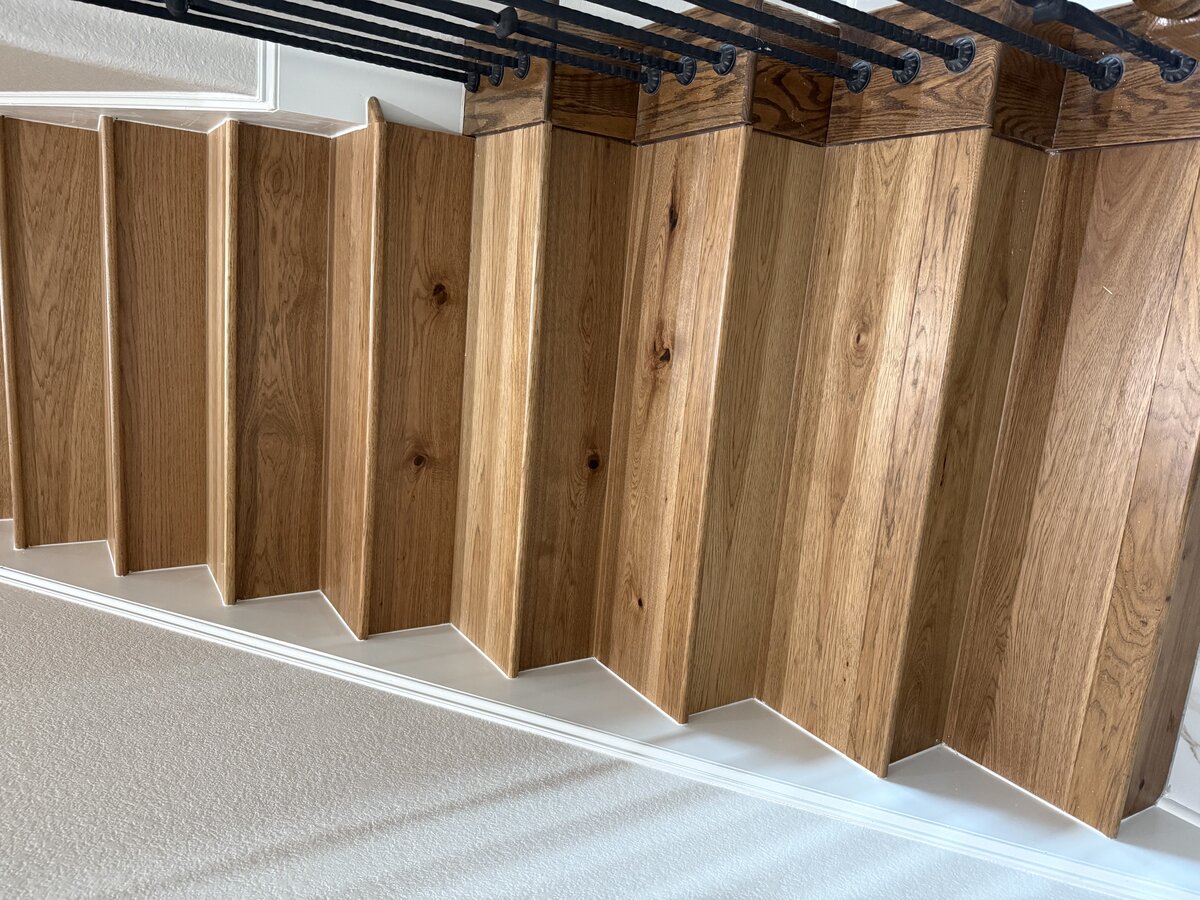 Wide plank hardwood flooring in honey oak