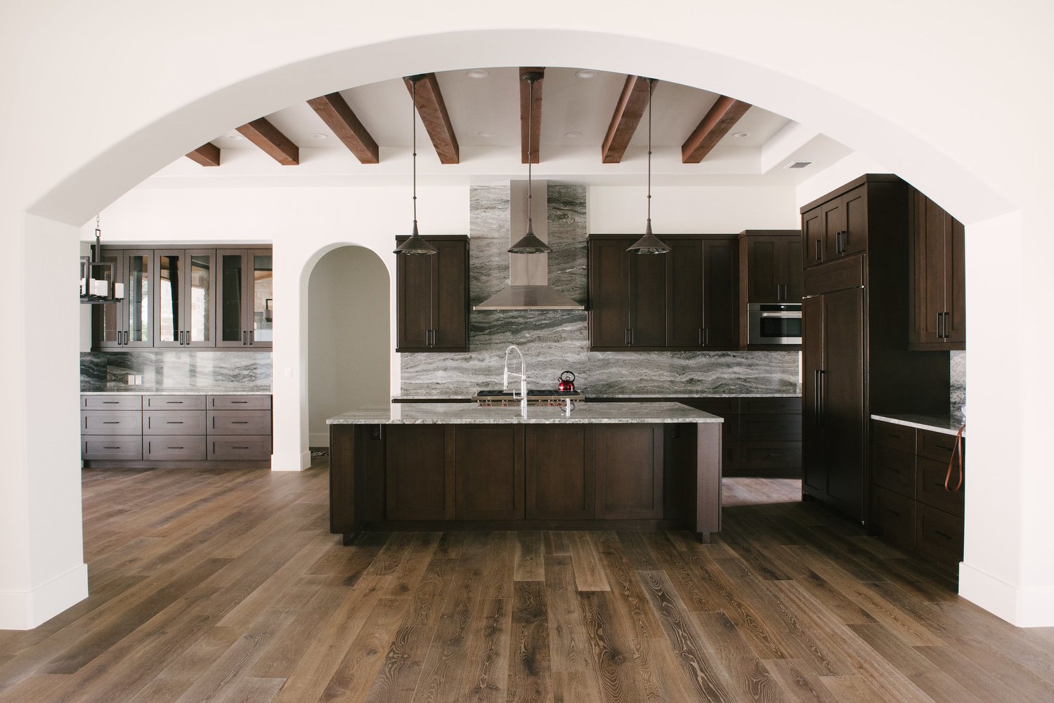 Modern dark hardwood flooring in Austin kitchen