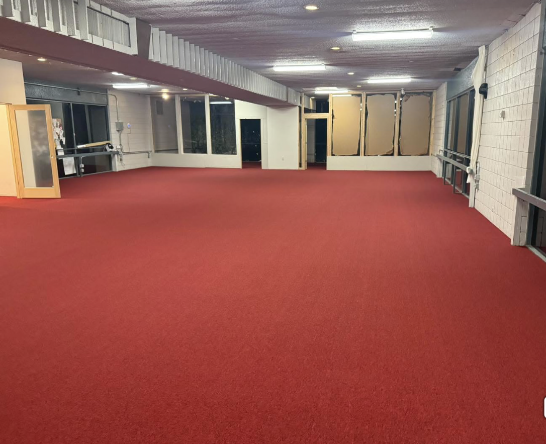 Open-plan office LVP flooring installation Austin TX